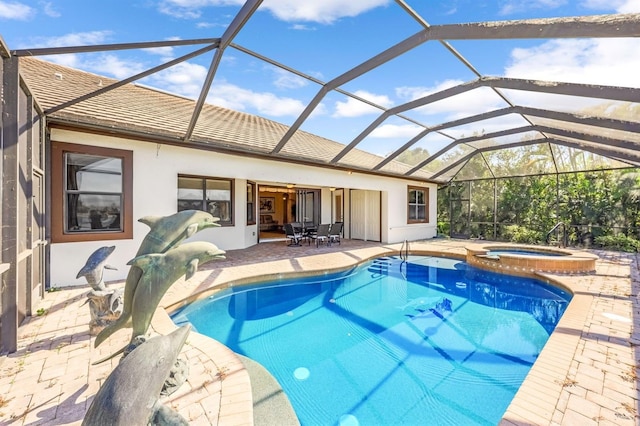 view of swimming pool featuring a lanai, an in ground hot tub, and a patio