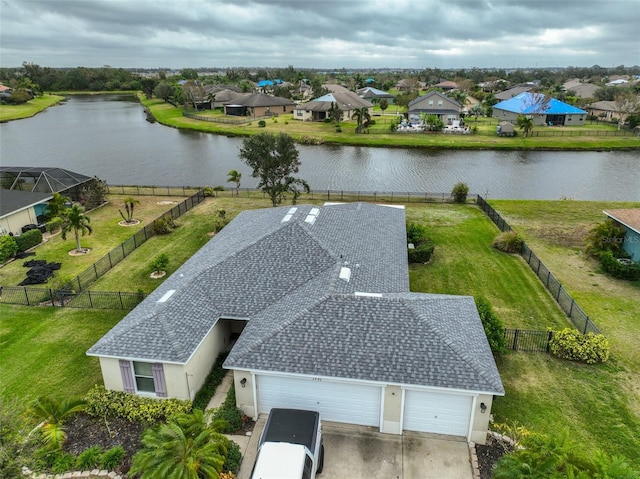 bird's eye view with a water view