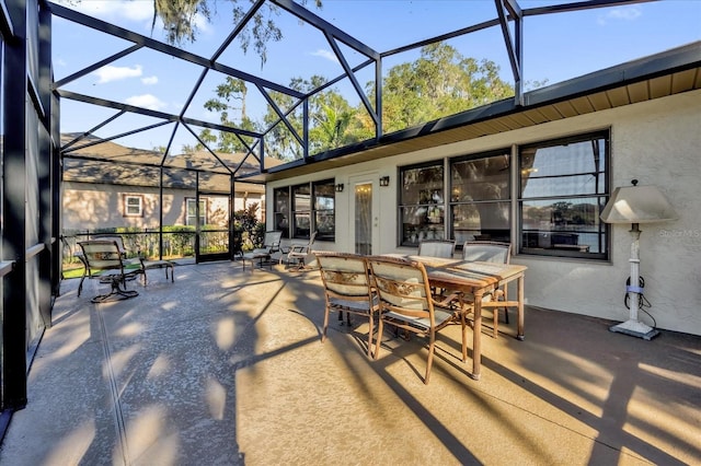 view of patio / terrace with glass enclosure