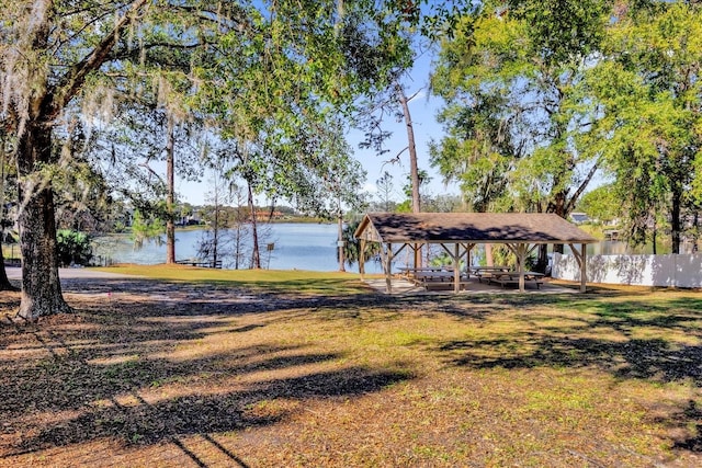 view of yard with a water view and a gazebo