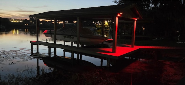 view of dock with a water view