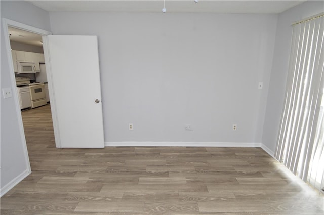 empty room featuring light hardwood / wood-style flooring