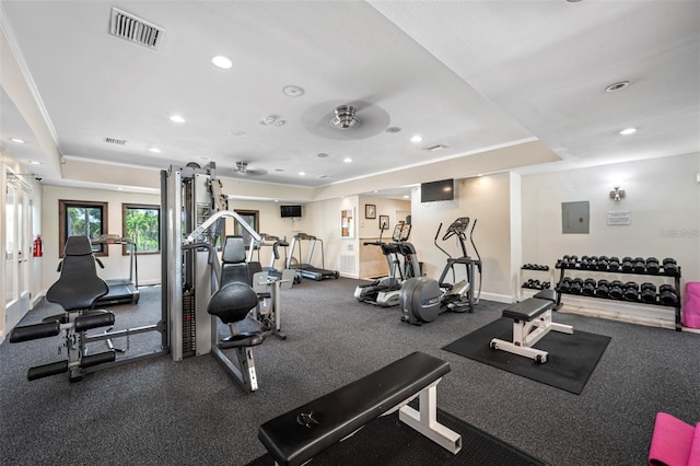 gym with ceiling fan and electric panel