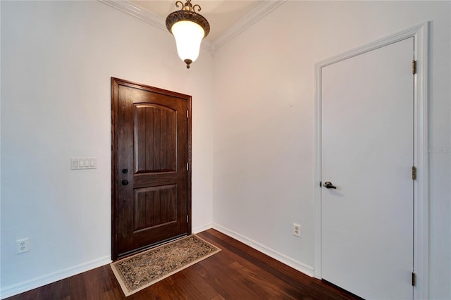 entryway featuring dark hardwood / wood-style flooring and ornamental molding