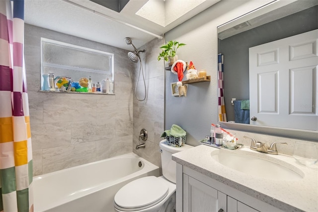 full bathroom with shower / tub combo, vanity, and toilet