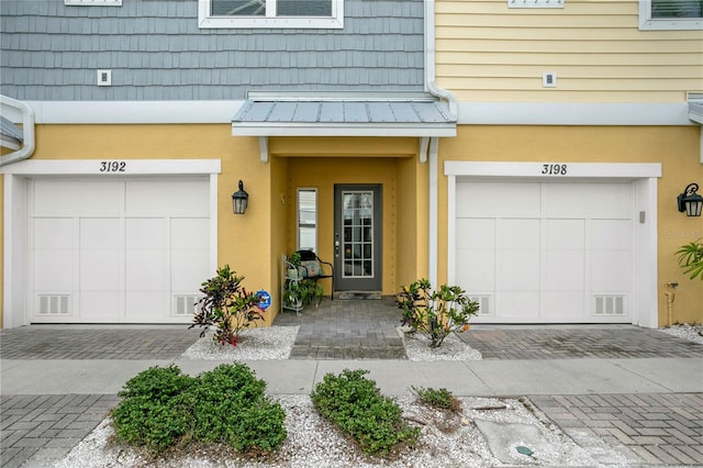 entrance to property with a garage