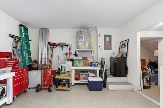 garage with electric panel and electric water heater