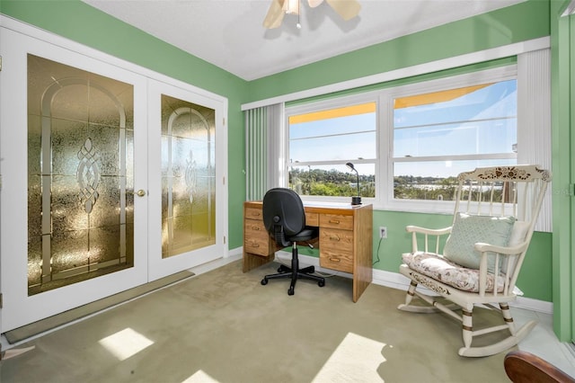 carpeted office with baseboards and french doors