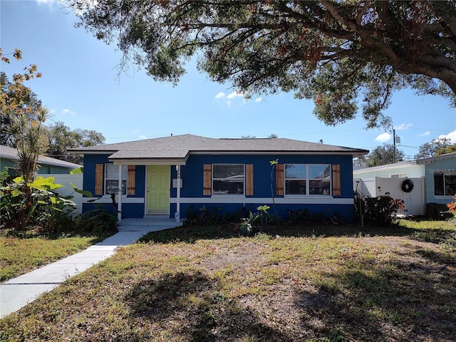 view of front of home with a front yard