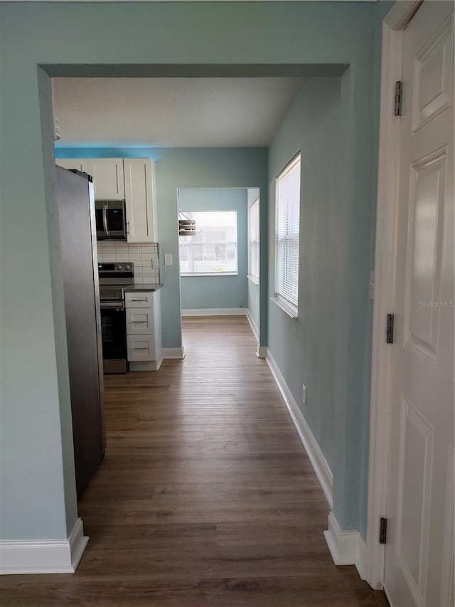 hall featuring dark hardwood / wood-style floors