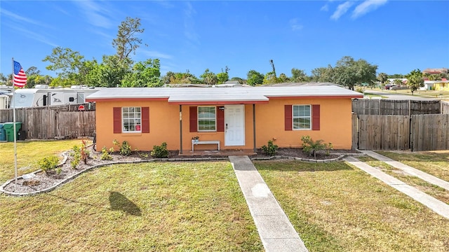 view of front of property with a front yard