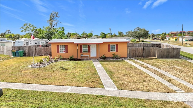 view of front of home with a front yard