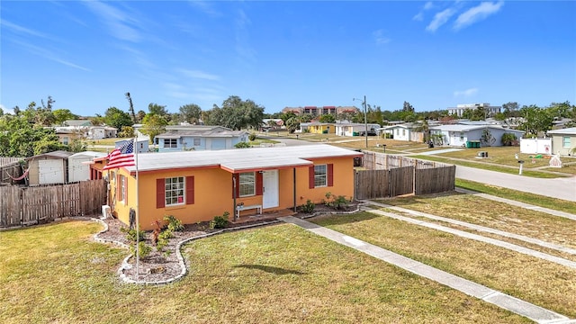 view of front of house with a front lawn