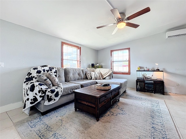 living room with lofted ceiling, light tile patterned floors, and a wall mounted AC