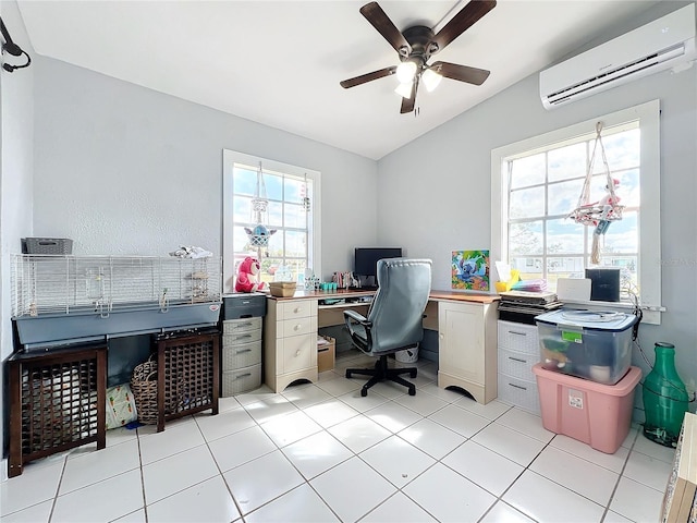 office space with ceiling fan, light tile patterned floors, and a wall unit AC