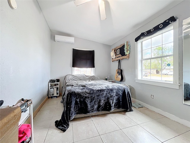 bedroom with a wall unit AC, ceiling fan, light tile patterned flooring, and vaulted ceiling