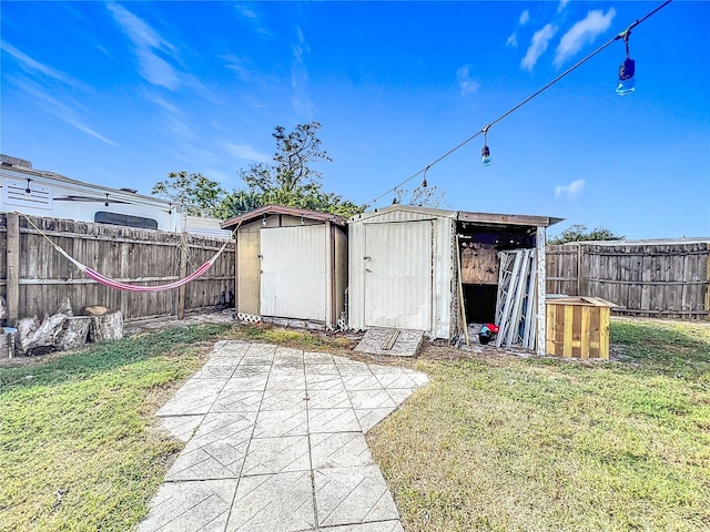 view of outbuilding featuring a lawn