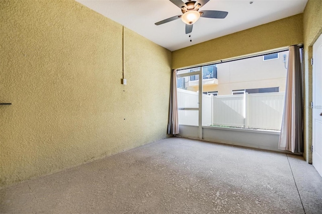 empty room featuring ceiling fan