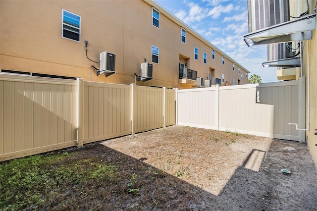 view of yard featuring central AC