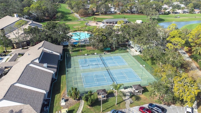 drone / aerial view with a water view