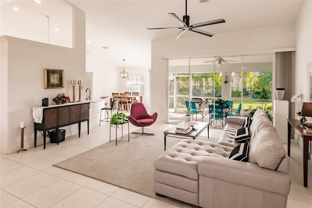 tiled living room with ceiling fan