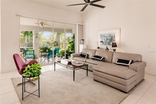 tiled living room featuring ceiling fan