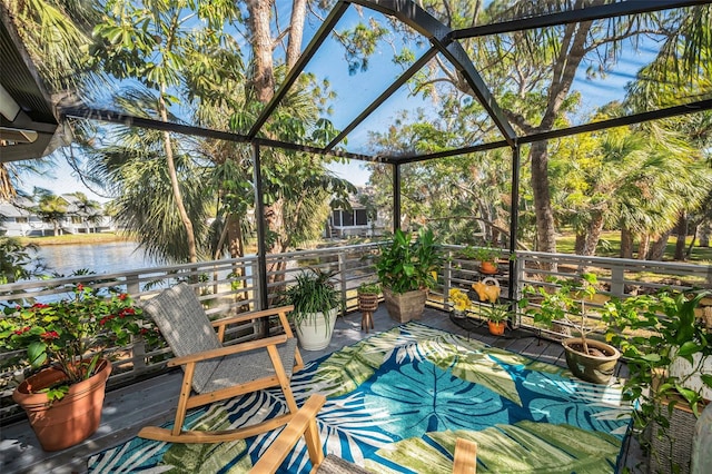 1012 Osprey Ct, Tarpon Springs, FL 34689 - sunroom / solarium with a water view