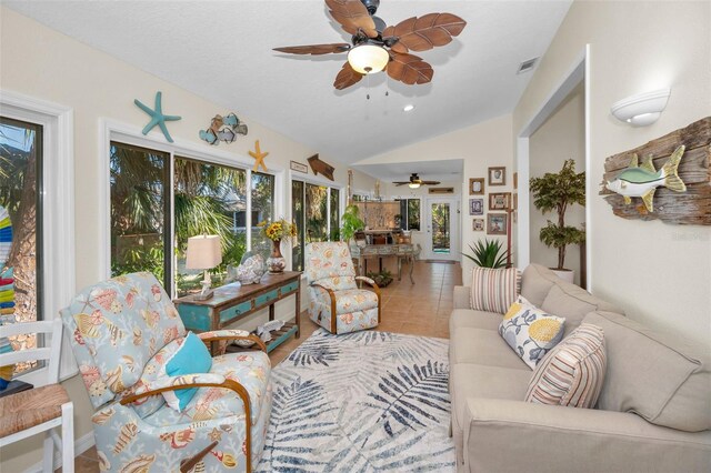 1012 Osprey Ct, Tarpon Springs, FL 34689 - sunroom with plenty of natural light, lofted ceiling, and tile patterned floors