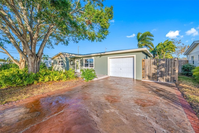 single story home with a garage