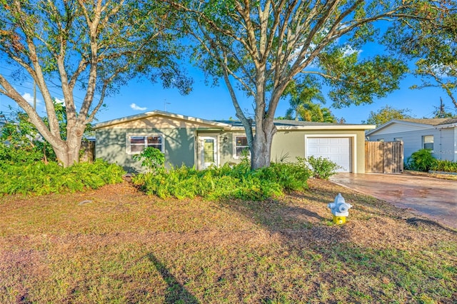 single story home with a garage