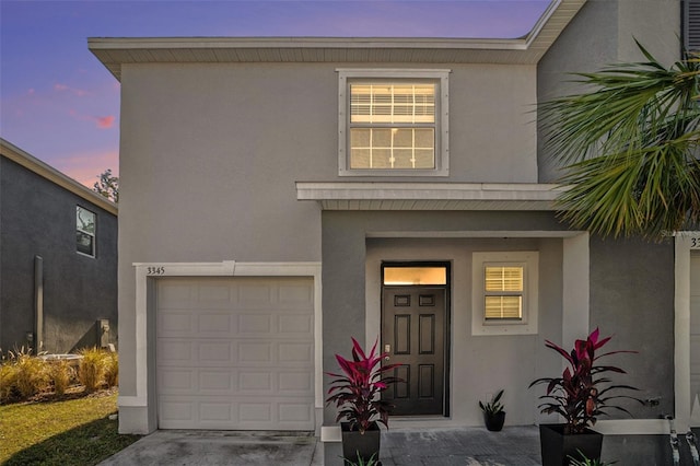 view of front of home with a garage