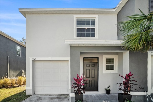 view of front of home with a garage