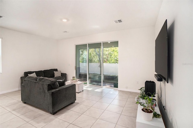 living room with light tile patterned flooring