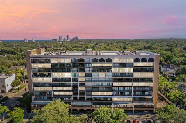 view of outdoor building at dusk