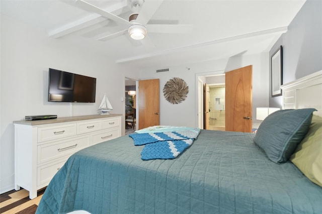 bedroom with connected bathroom, ceiling fan, and light hardwood / wood-style flooring