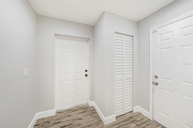 doorway to outside featuring light wood-type flooring