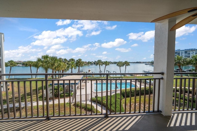 balcony featuring a water view