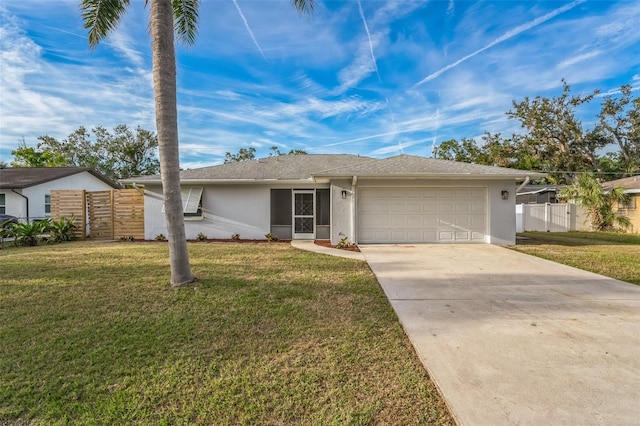 single story home with stucco siding, driveway, a front lawn, fence, and an attached garage