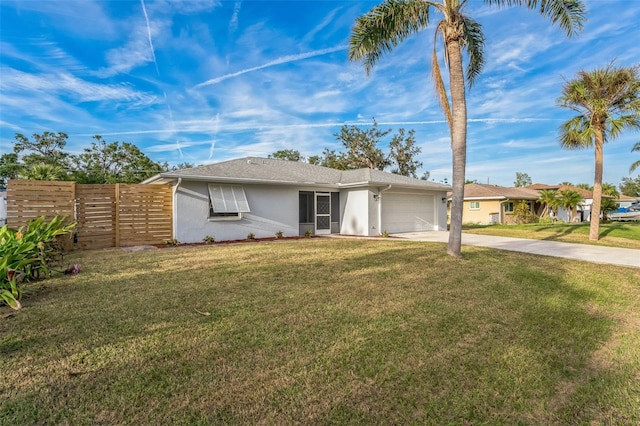 ranch-style house with a front lawn and a garage