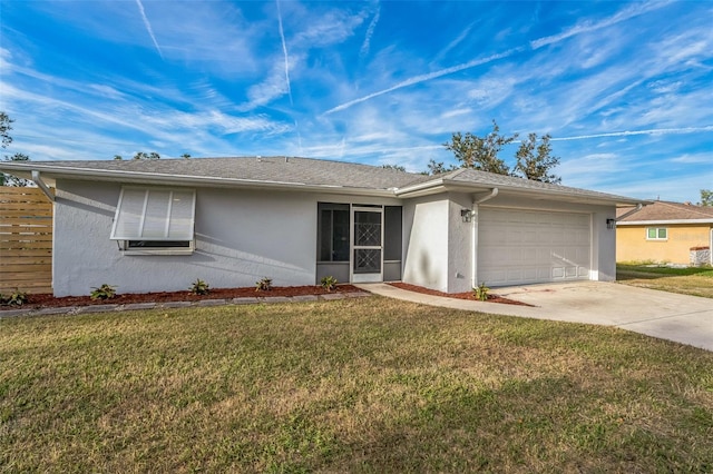 ranch-style home with stucco siding, a front yard, a garage, and driveway