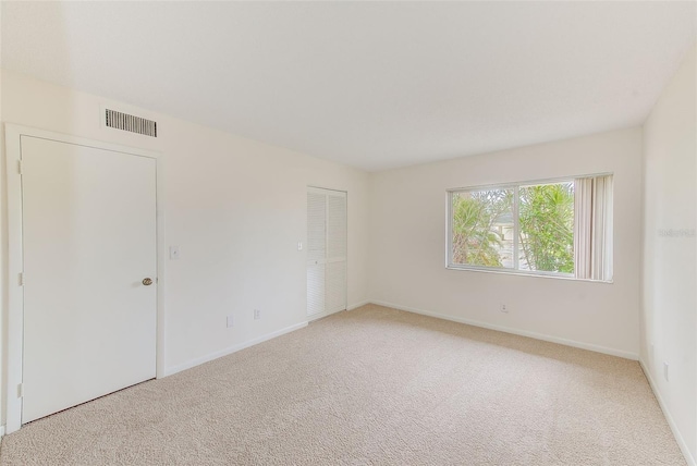 empty room featuring carpet floors