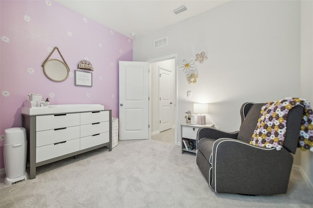 living area with light carpet and lofted ceiling