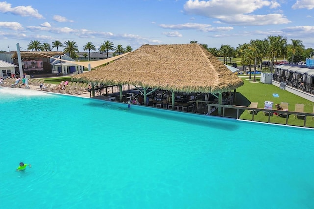 view of swimming pool featuring a gazebo and a yard