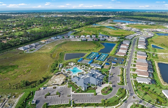 aerial view featuring a residential view and a water view