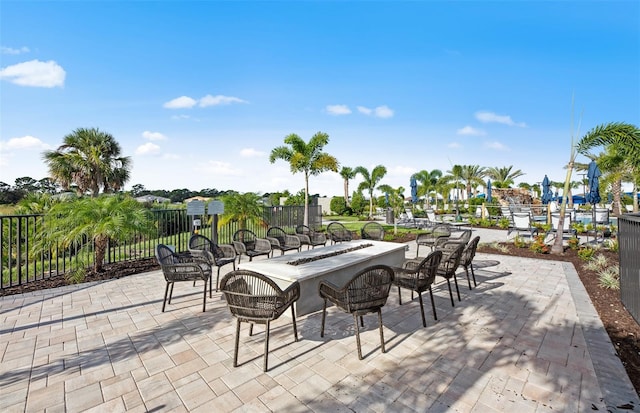 view of patio featuring fence