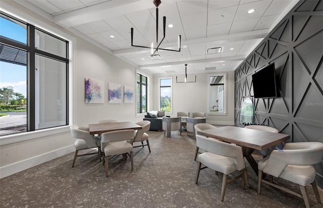 dining space with recessed lighting, a paneled ceiling, and baseboards