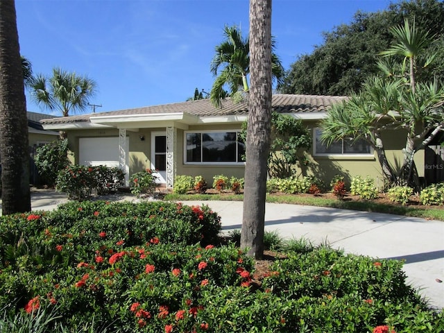 ranch-style house with a garage