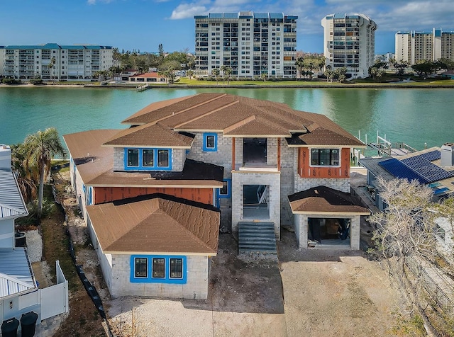 bird's eye view with a water view