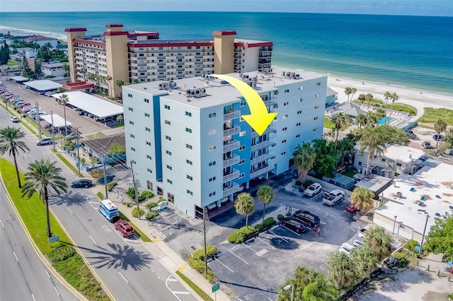 bird's eye view featuring a beach view and a water view