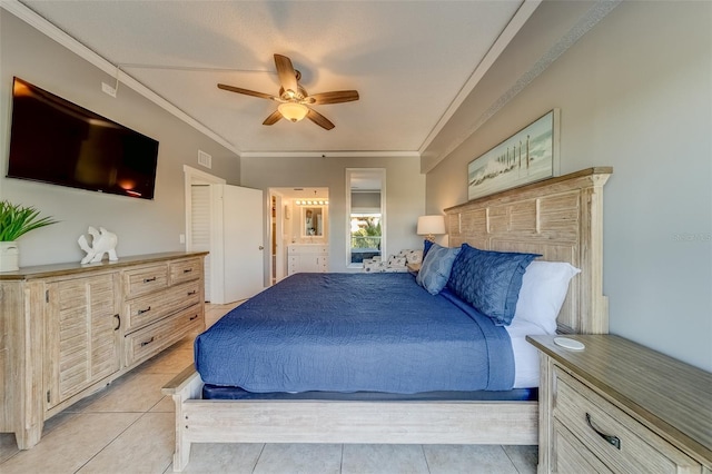 tiled bedroom featuring ceiling fan and crown molding